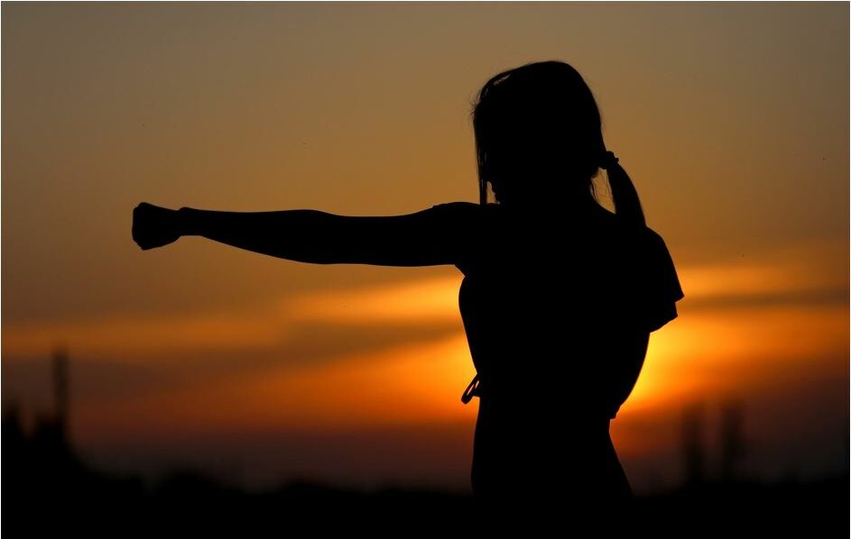 Shadow of a woman boxing