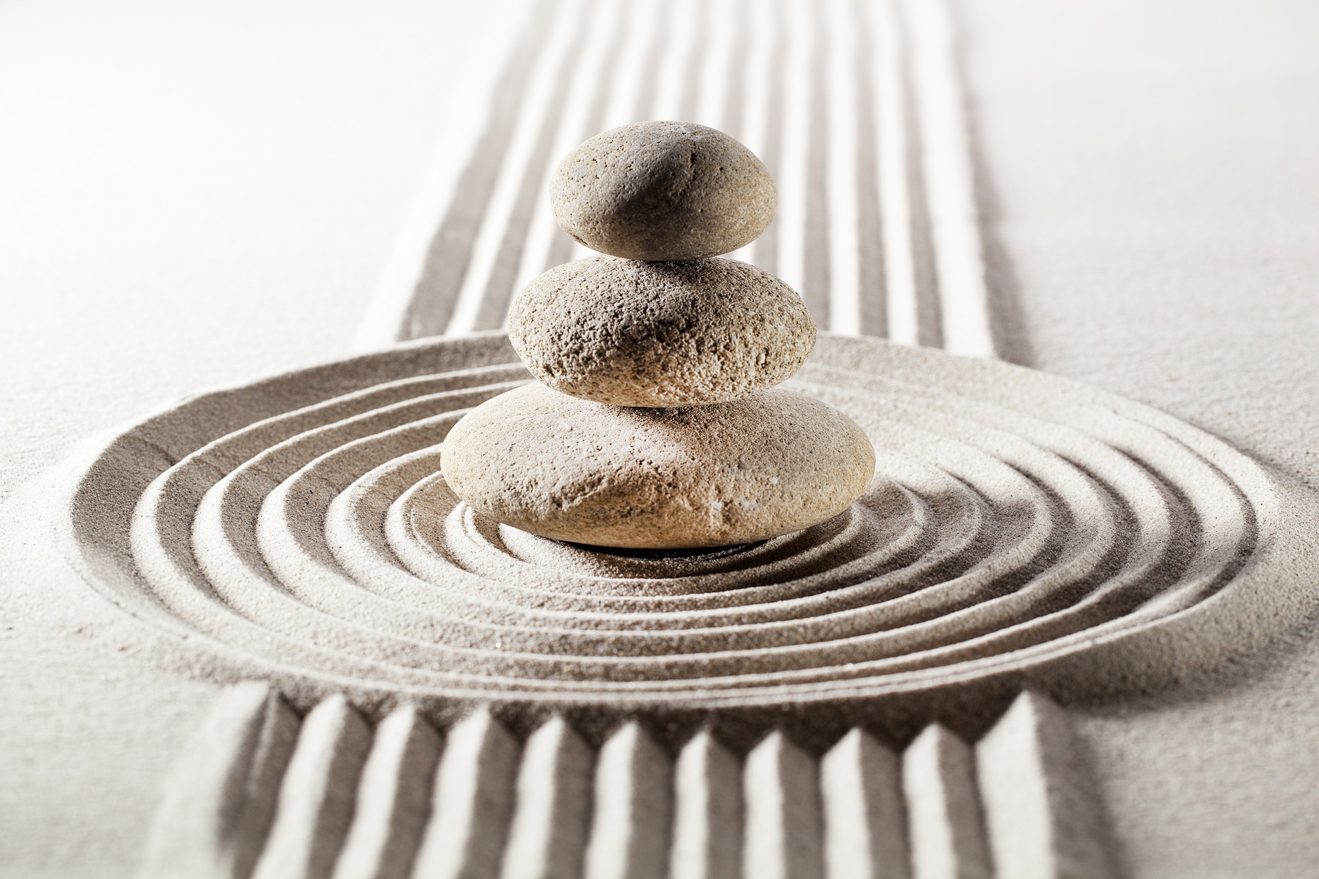 stones symbolize balance with sand