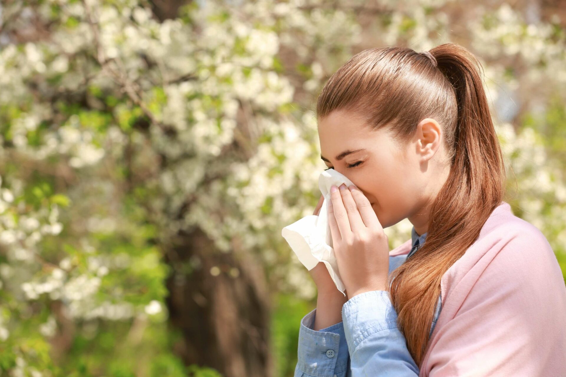 young woman with pollen allergy