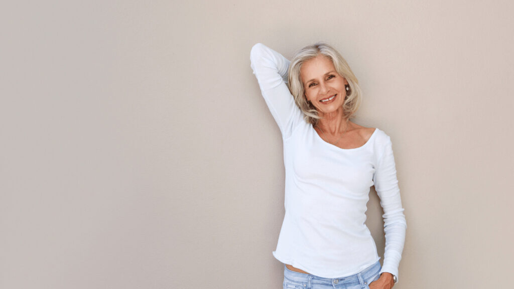 woman in menopause poses for webinar